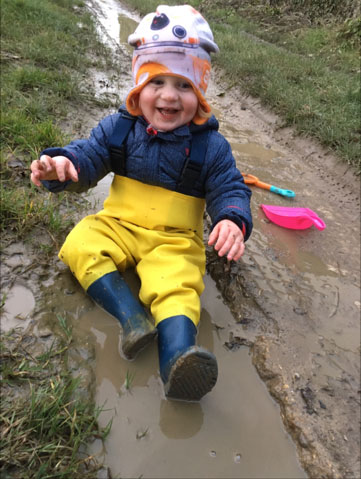 Archie age 2, loves his waders, loves mud!
