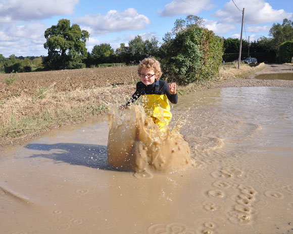 Splashing in muddy puddles!