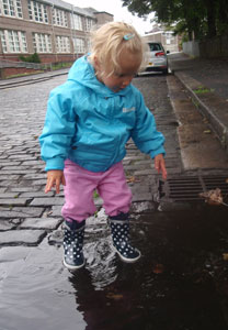Kasia's little girl in Playshoes Navy Dots wellies