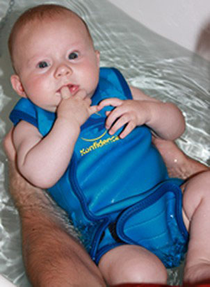 Gabriel trying out his new Baby Warma wetsuit