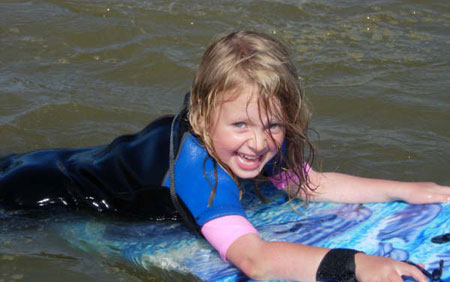 Abbie having fun in her TWF wetsuit