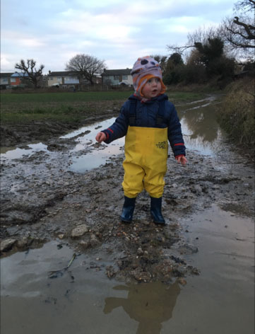 Archie age 2, loves his waders, loves mud!