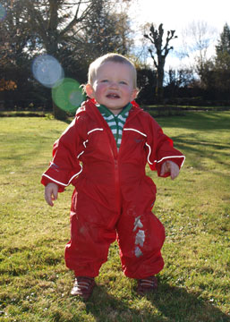 Dylan having fun in his puddle suit