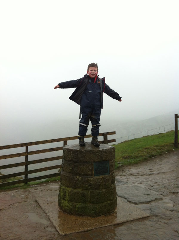 Gregor on his first mountain walk, snug in Ocean Rainwear Dungarees