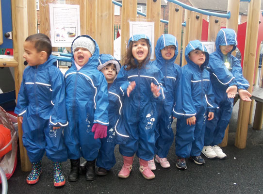The nursery kids enjoying the outdoors in Regatta puddle suits
